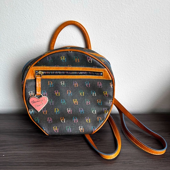 Dooney & Bourke Handbags - Dooney & Burke Logo Circle Backpack